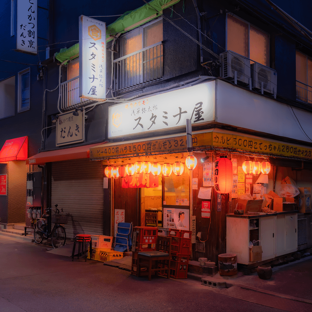 The scene unfolds outdoors in an urban setting during the gentle fade of dusk, casting a warm, ambient light over the surroundings.