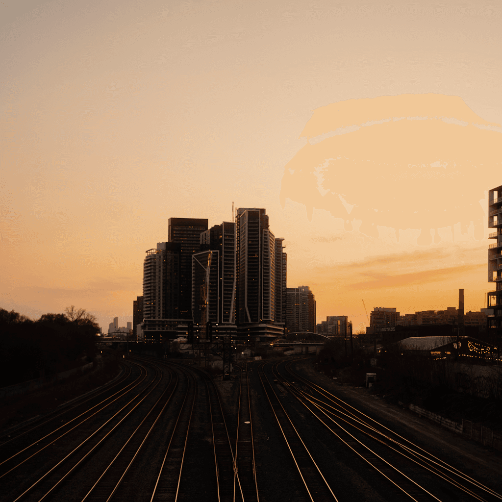The scene is set outdoors during the fading light of dusk, casting a warm, golden glow across the sky.
